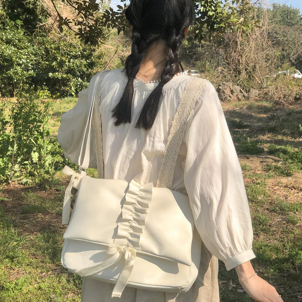 |ovuni| RUFFLE ENVELOPE BAG IVORY